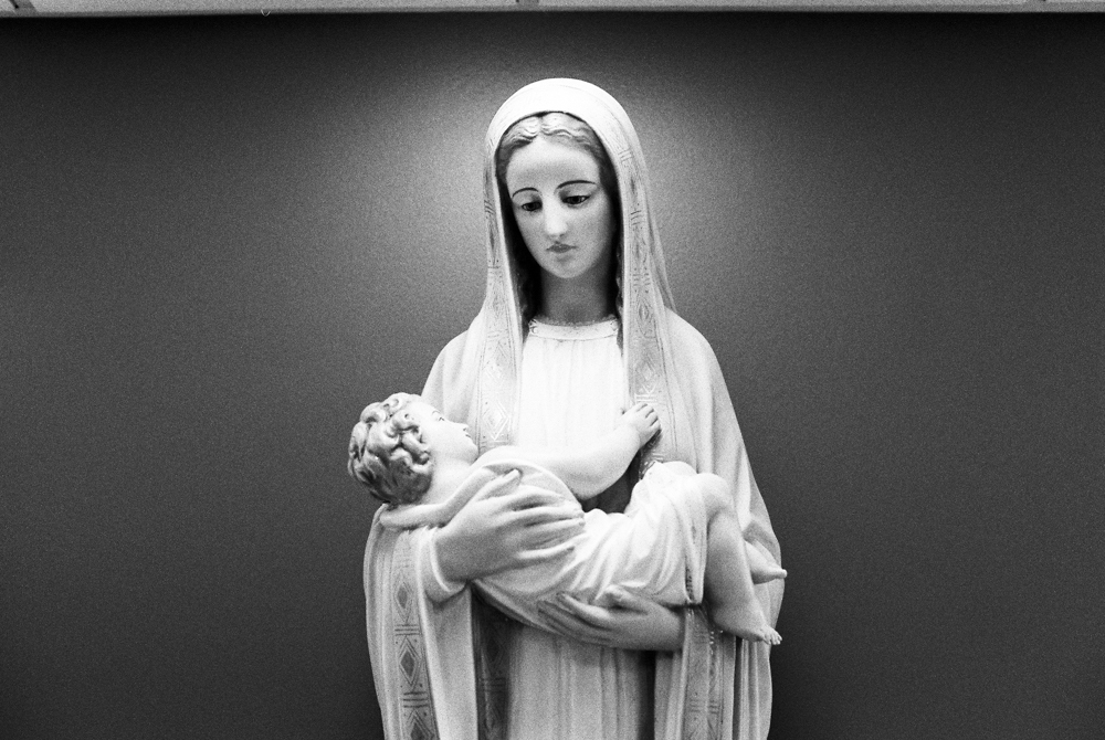 statue of mother mary holding jesus