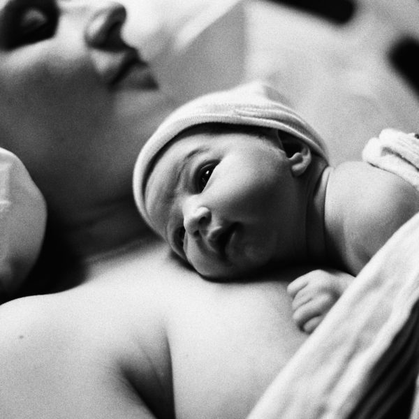 newborn baby on mother's chest