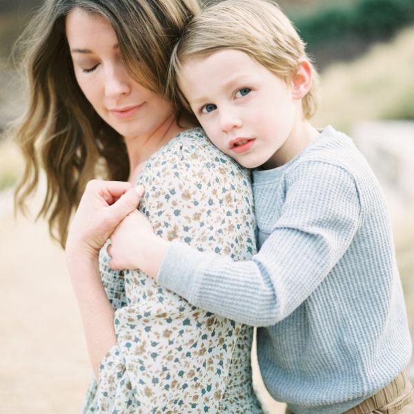 son hugging mother