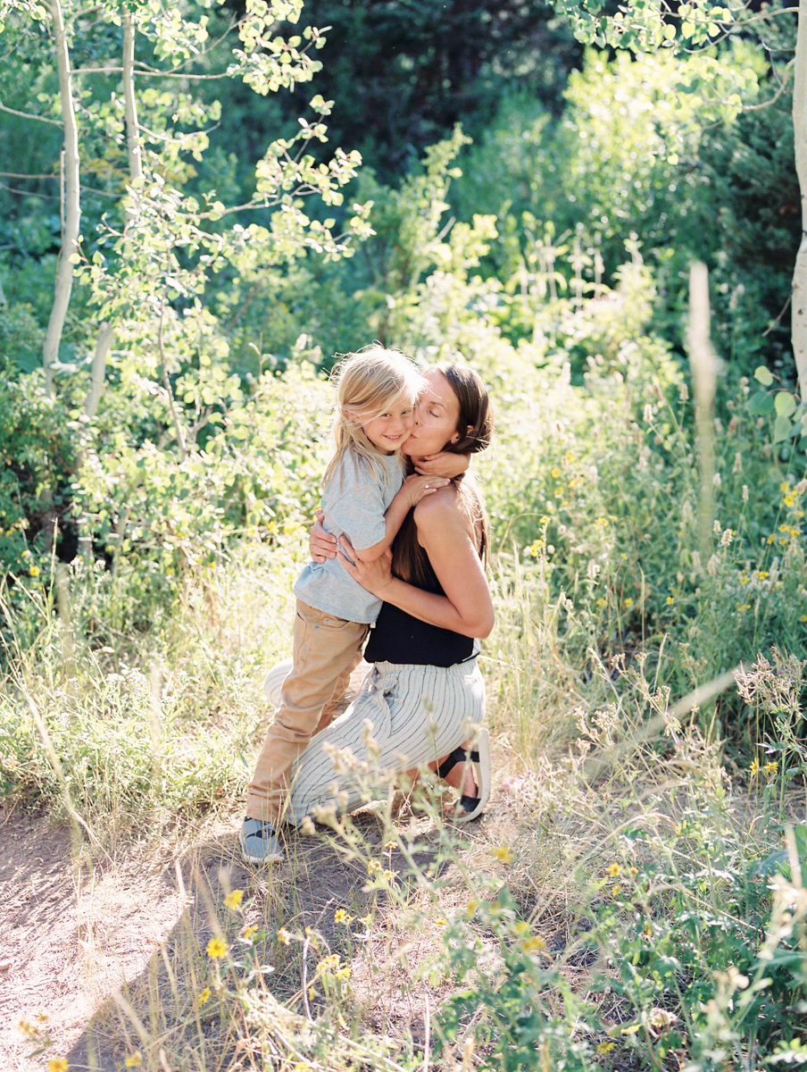 son hugging mother