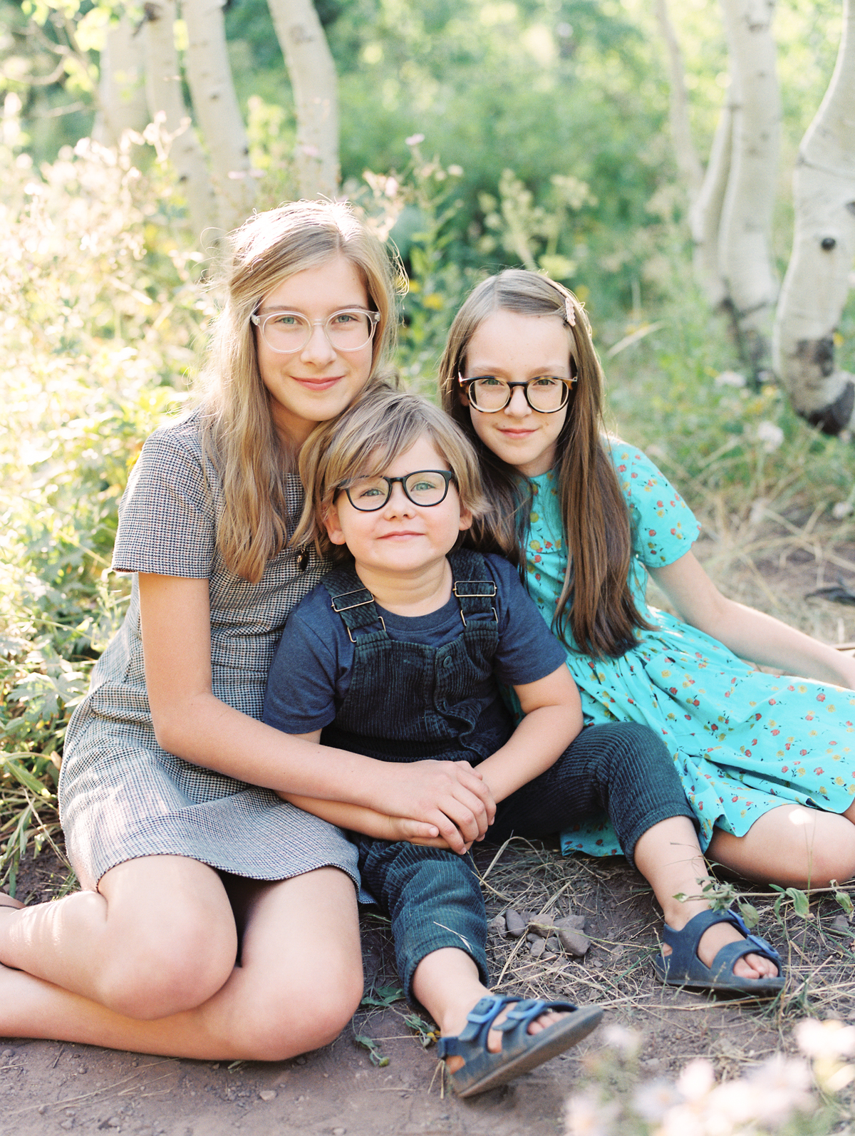 portrait of three siblings