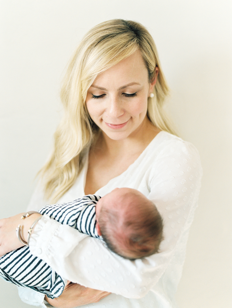 mother holding newborn baby