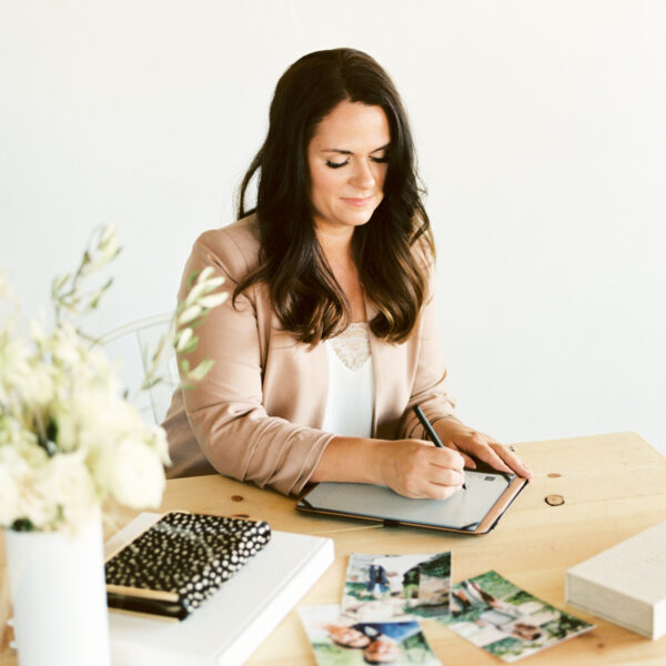 business woman sitting at desk working