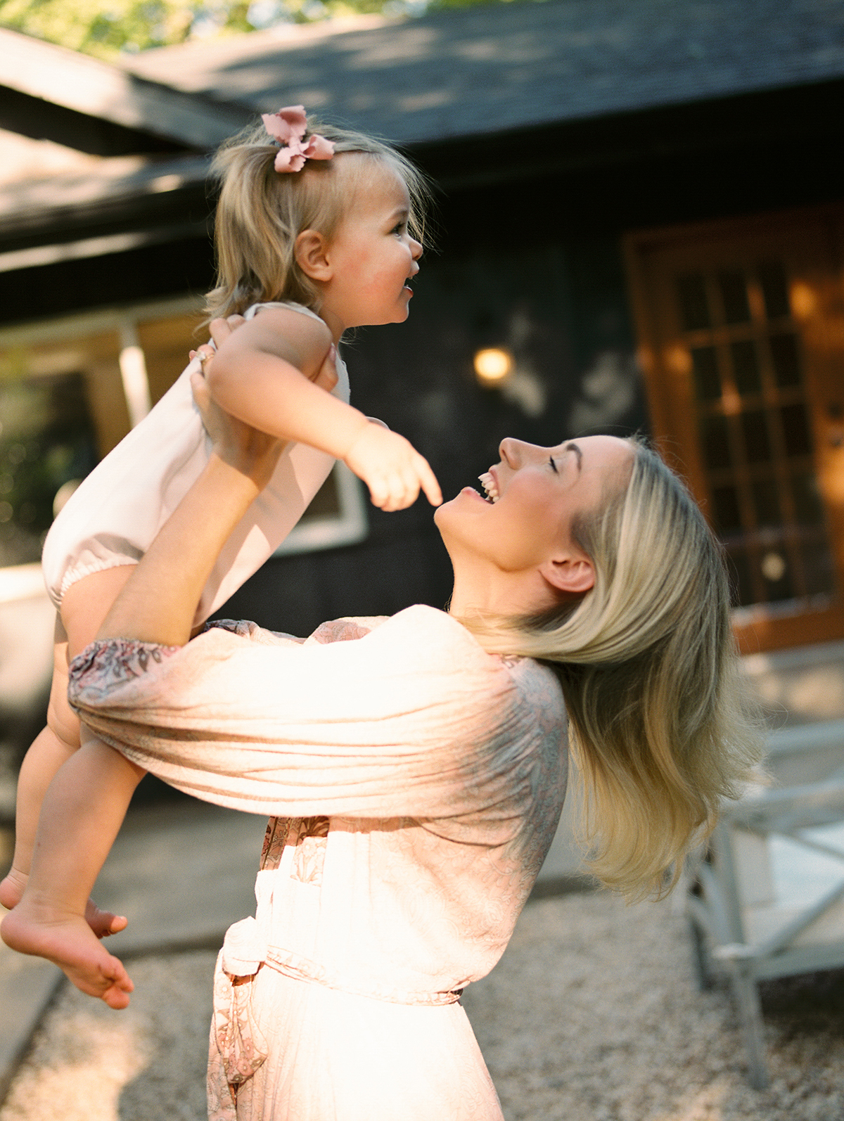 family photo by OKC film photographer featuring a mother with her young daughter