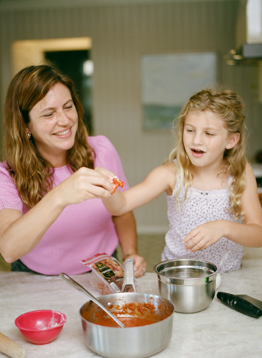 mother and daughter cooking together